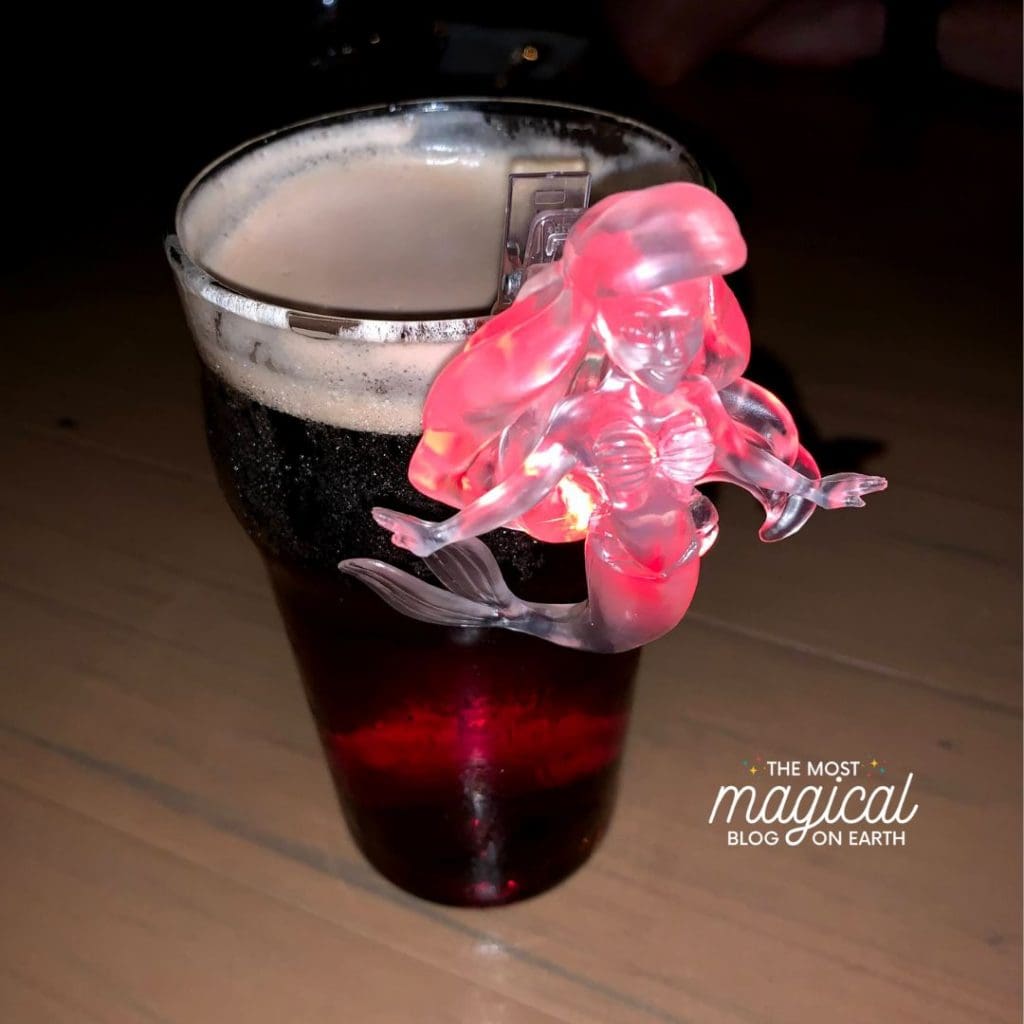dark brown, red beer with light up attached mermaid